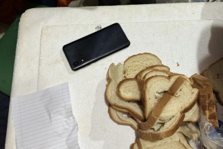 Quadrilha que usava nome da PF para fraudes escondia celulares em pães