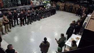 Agentes de segurança se reúnem durante megaoperação contra o PCC (Foto: Divulgação/MPSC)